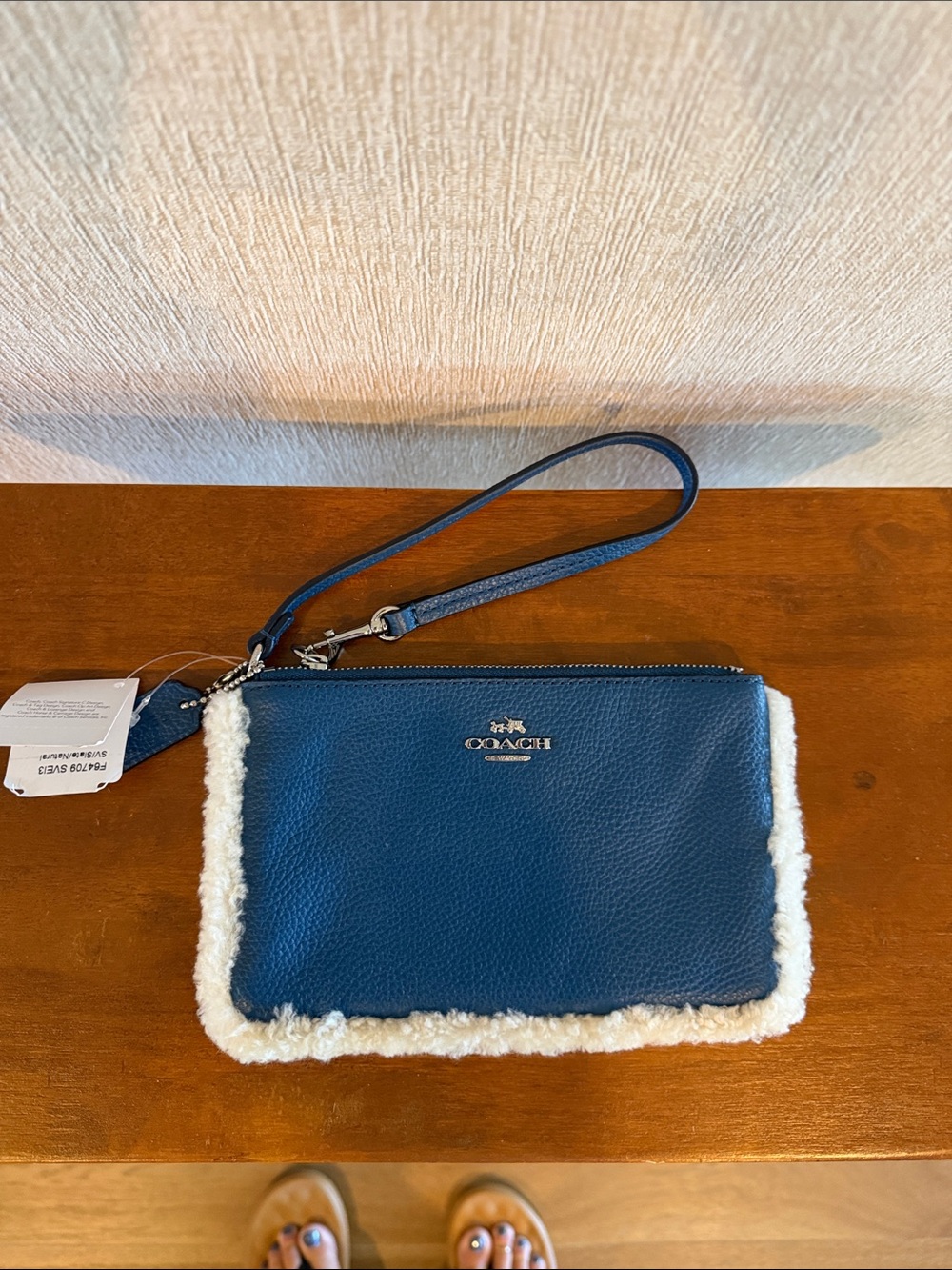Coach Navy Leather Wristlet with White Shearling Trim